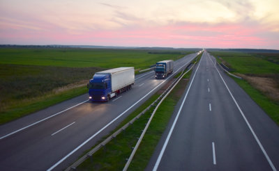 Goods delivery by roads. Services and Transport logistics. Soft focus, possible granularity.